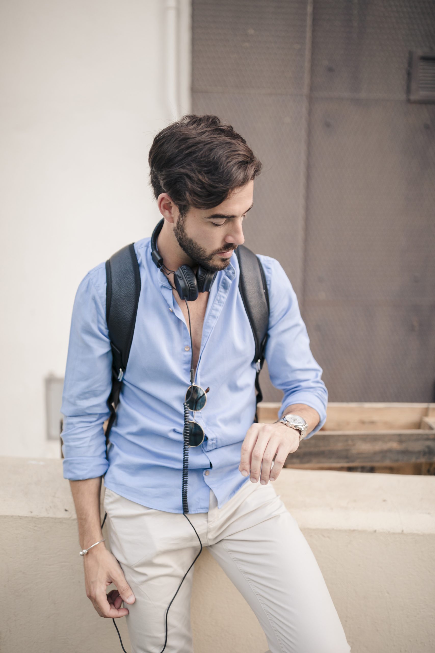 portrait-young-man-looking-time-watch (1)